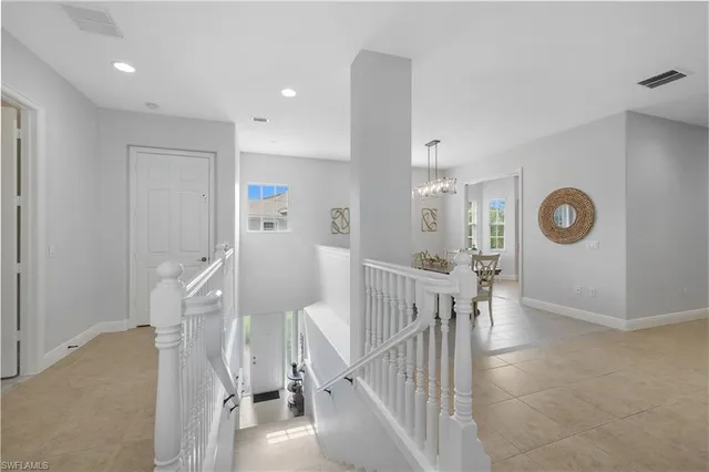 a view of a hallway with front door