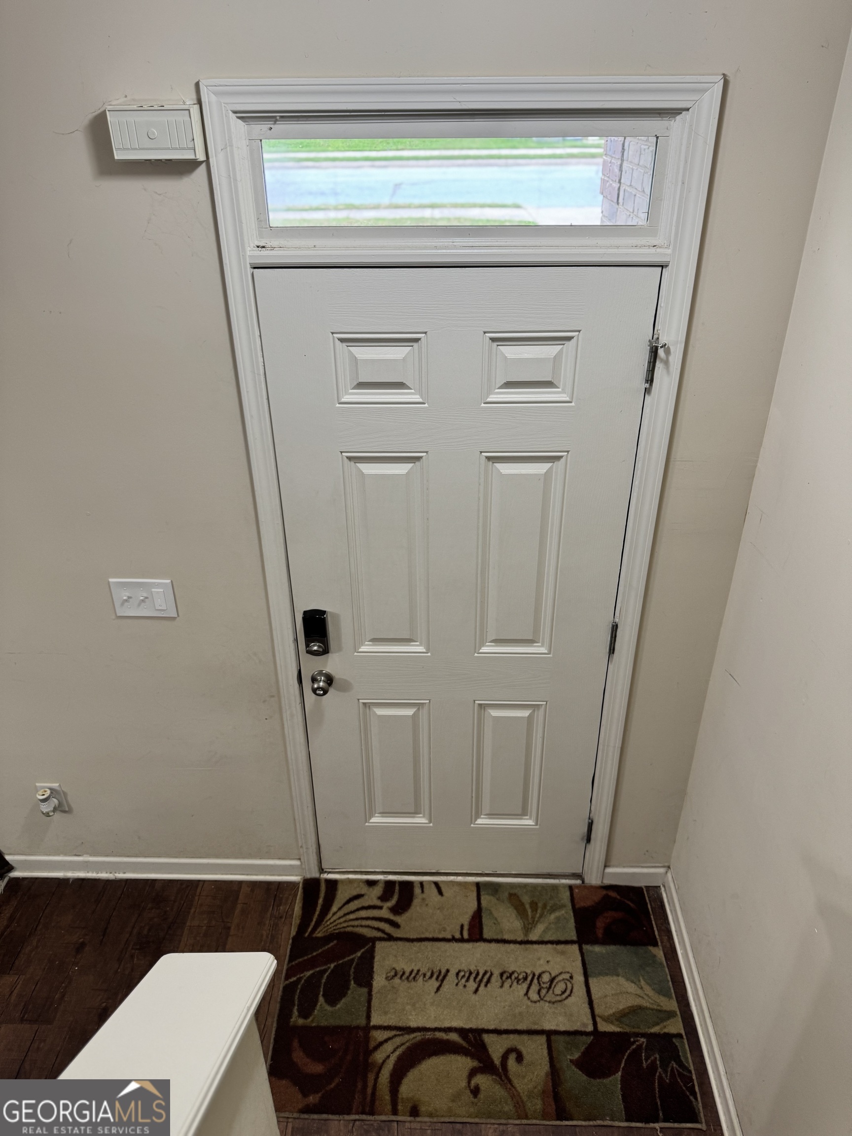 1133 Lehavre Court Hampton, GA 30228 - Photo 17 of 20 a room with water heater and a cabinet