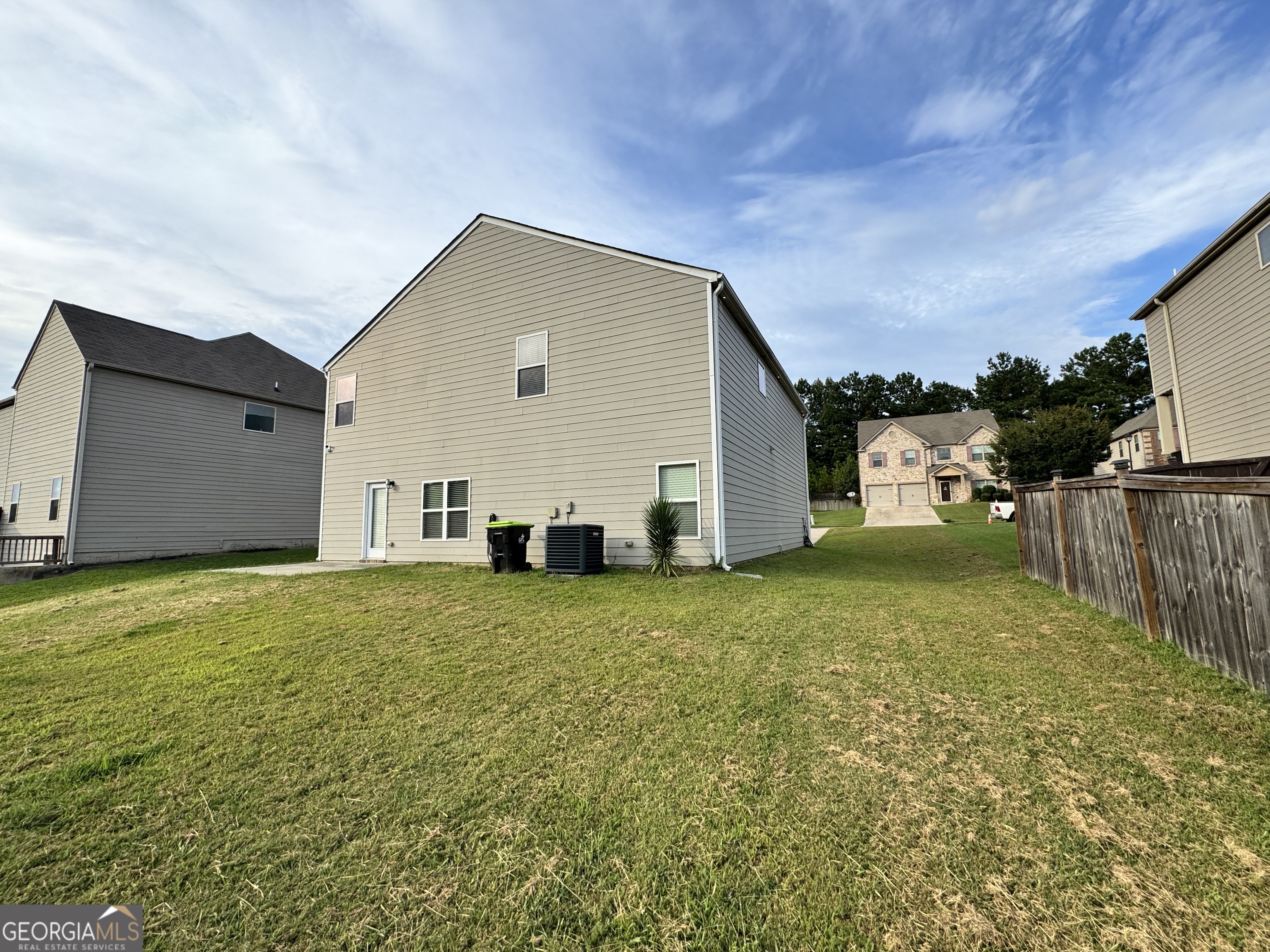 1133 Lehavre Court Hampton, GA 30228 - Photo 19 of 20 a view of a house with backyard