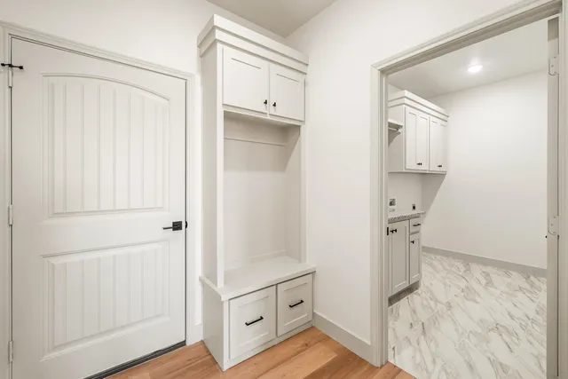 a view of kitchen with wooden floor
