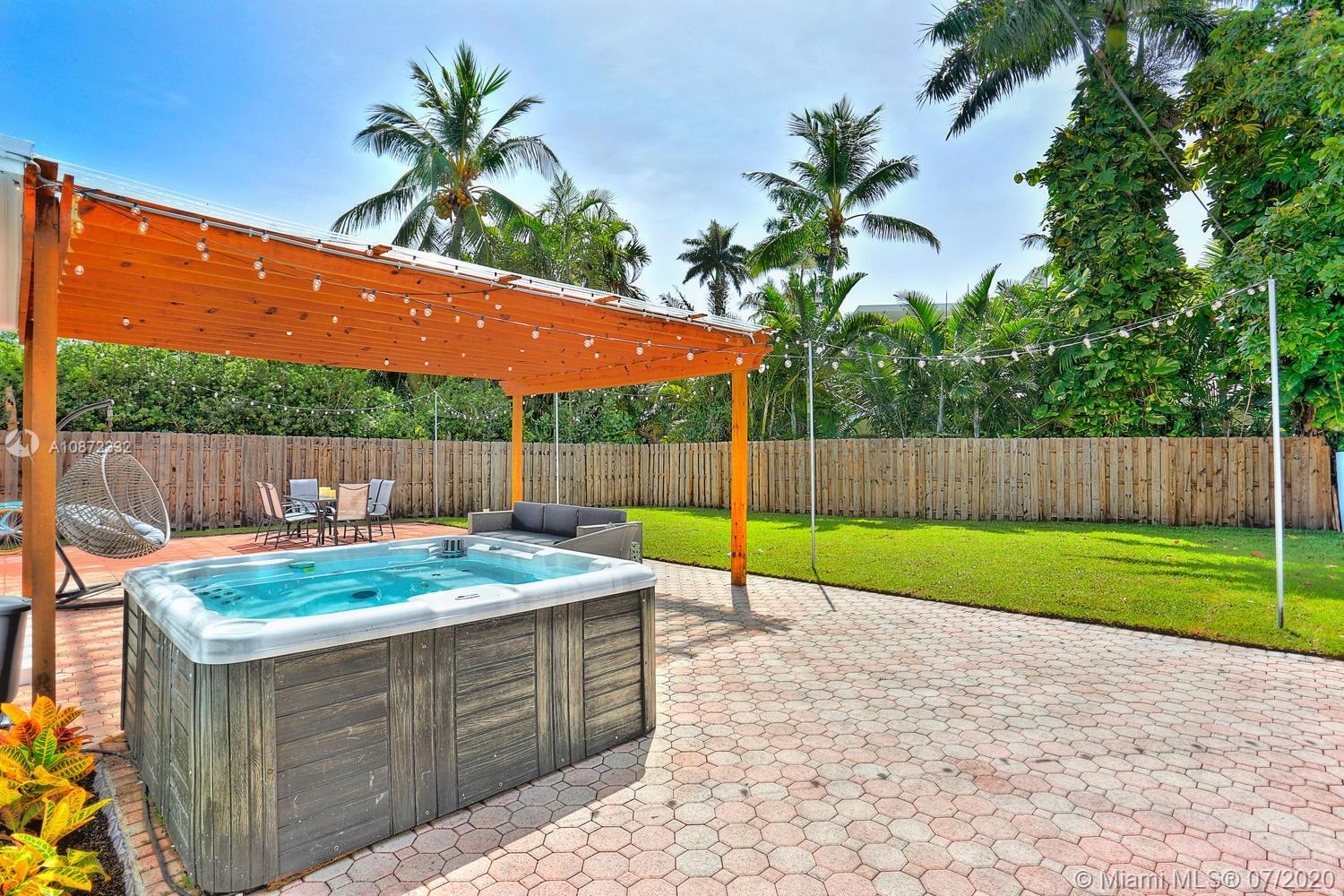 5161 Alton Road Miami Beach, FL 33140 - Photo 22 of 25 a view of outdoor space and yard