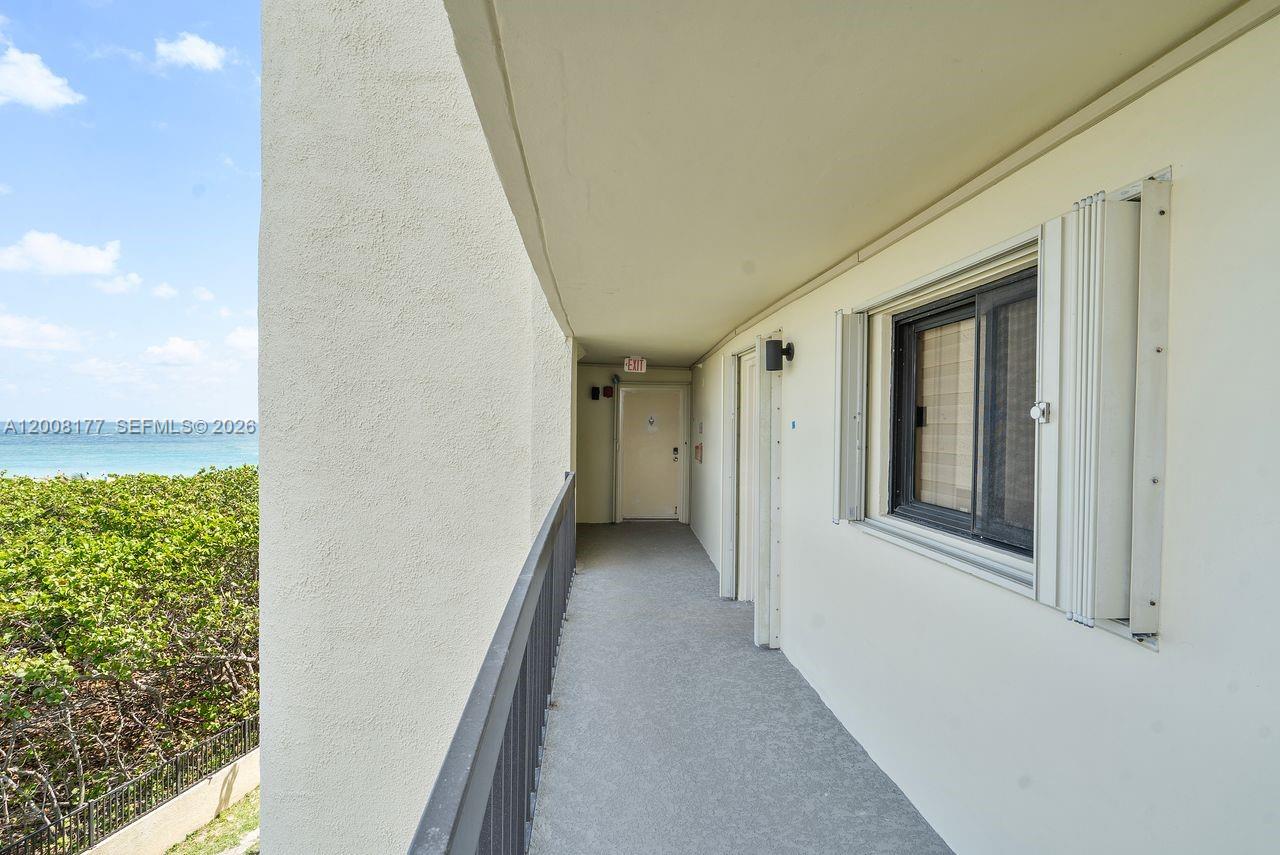 400 Ocean Trail Way, Unit 302 Jupiter, FL 33477 - Photo 27 of 29 a view of a hallway with closet and entryway