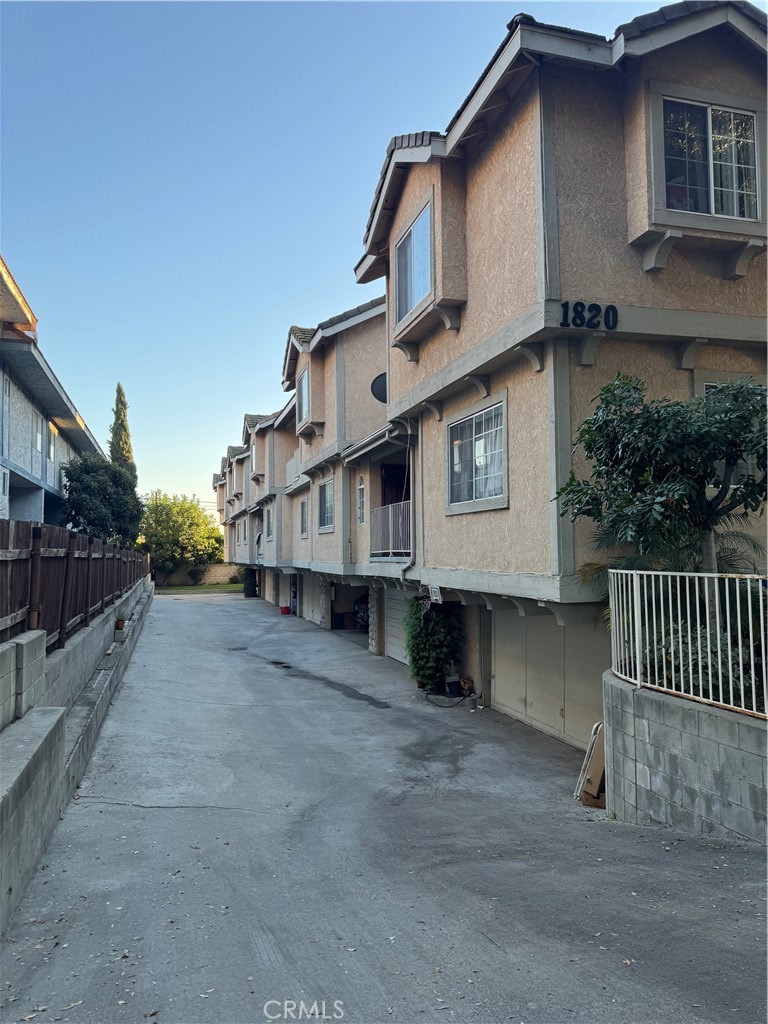 1820 Pepper Street, Unit E Alhambra, CA 91801 - Photo 2 of 30 a view of a house with wooden fence