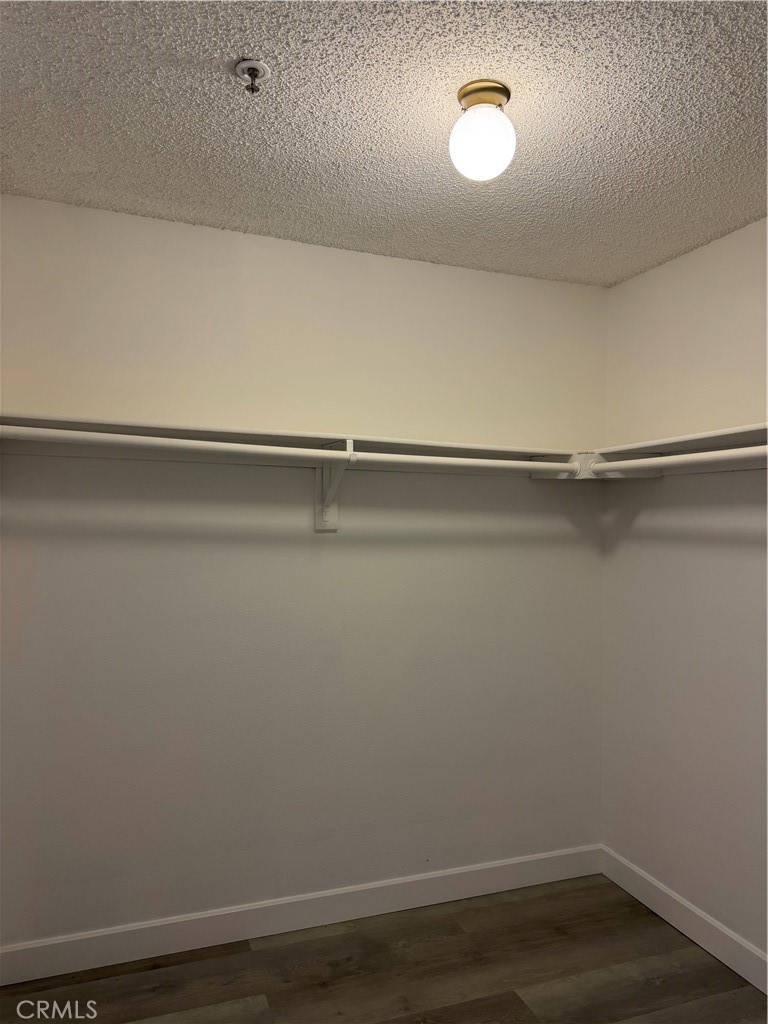 1820 Pepper Street, Unit E Alhambra, CA 91801 - Photo 23 of 30 a view of a room with racks on the wall