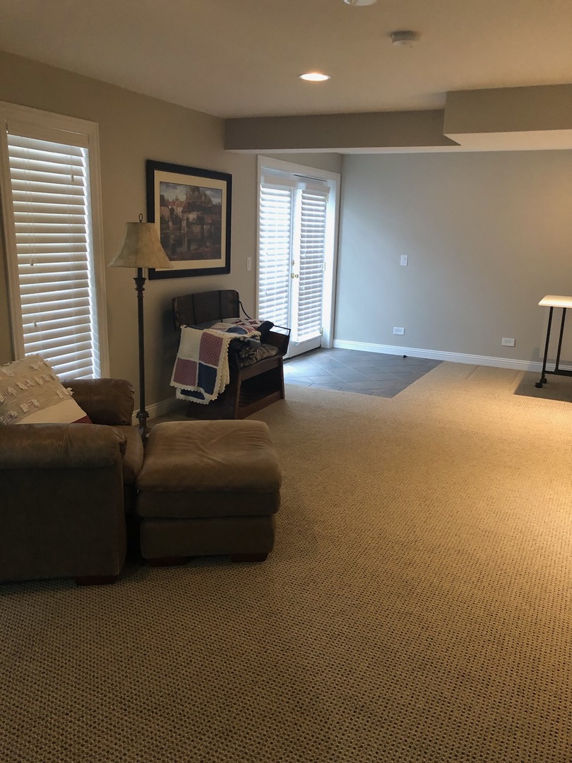 18591 Ridge Lane Marengo, IL 60152 - Photo 14 of 20 a living room with furniture and a fireplace