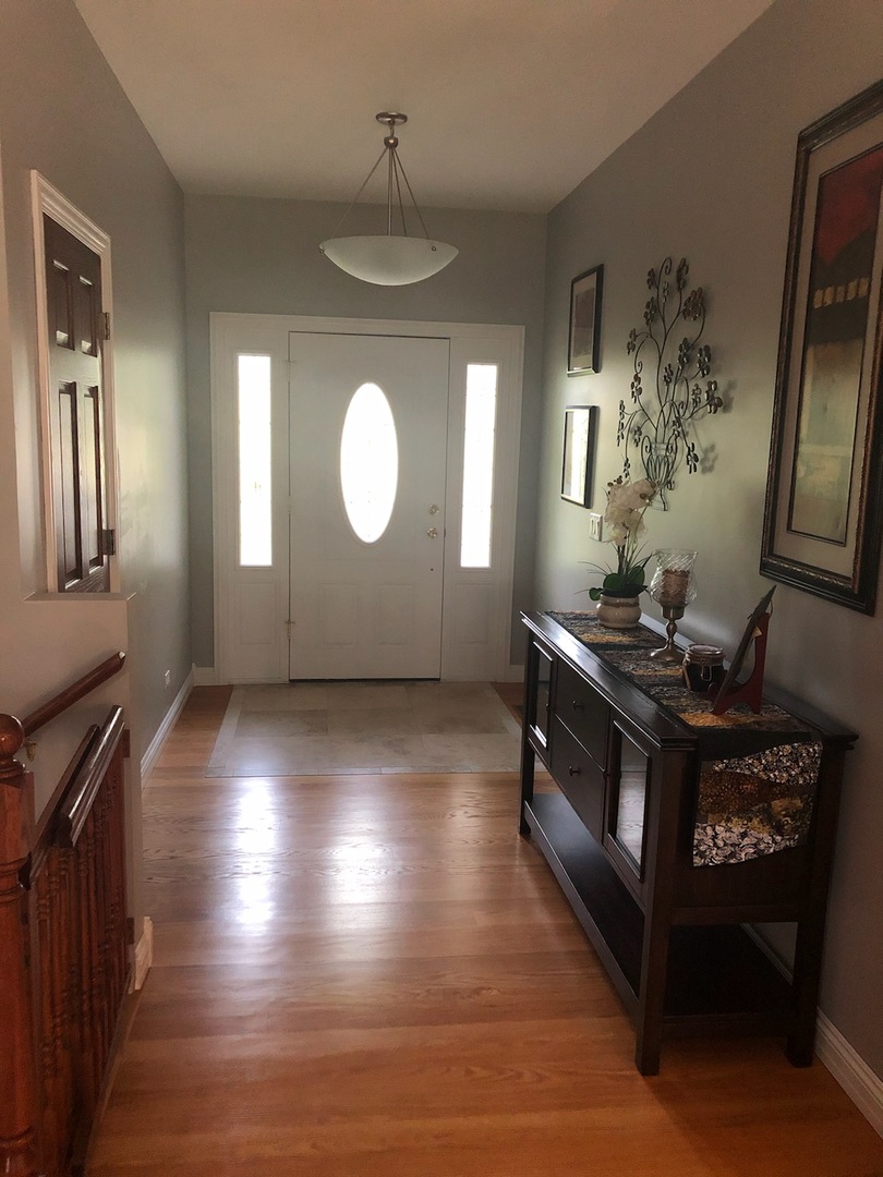 18591 Ridge Lane Marengo, IL 60152 - Photo 3 of 20 a living room with hard wood floors
