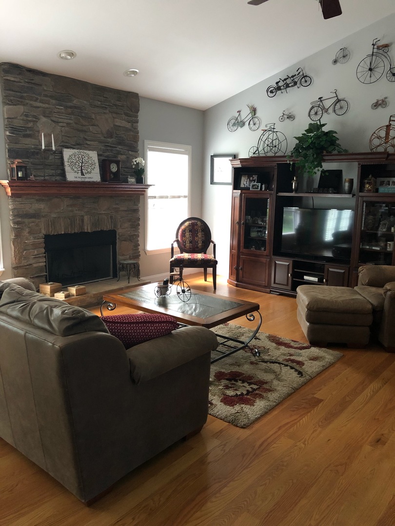 18591 Ridge Lane Marengo, IL 60152 - Photo 6 of 20 a living room with furniture and a flat screen tv