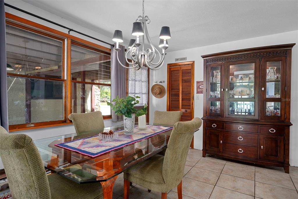 8605 Fussell Drive Wesley Chapel, FL 33545 - Photo 32 of 99 a dining room with furniture and window