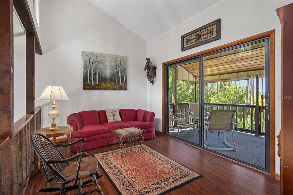 8605 Fussell Drive Wesley Chapel, FL 33545 - Photo 45 of 99 a living room with furniture and a window