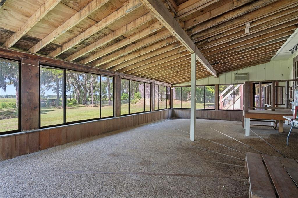 8605 Fussell Drive Wesley Chapel, FL 33545 - Photo 67 of 99 a view of an empty room with glass door
