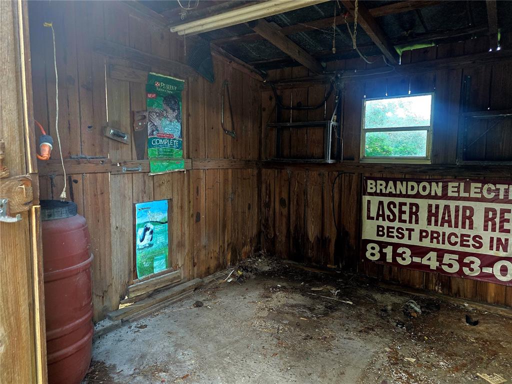 8605 Fussell Drive Wesley Chapel, FL 33545 - Photo 85 of 99 a view of front door and wooden door