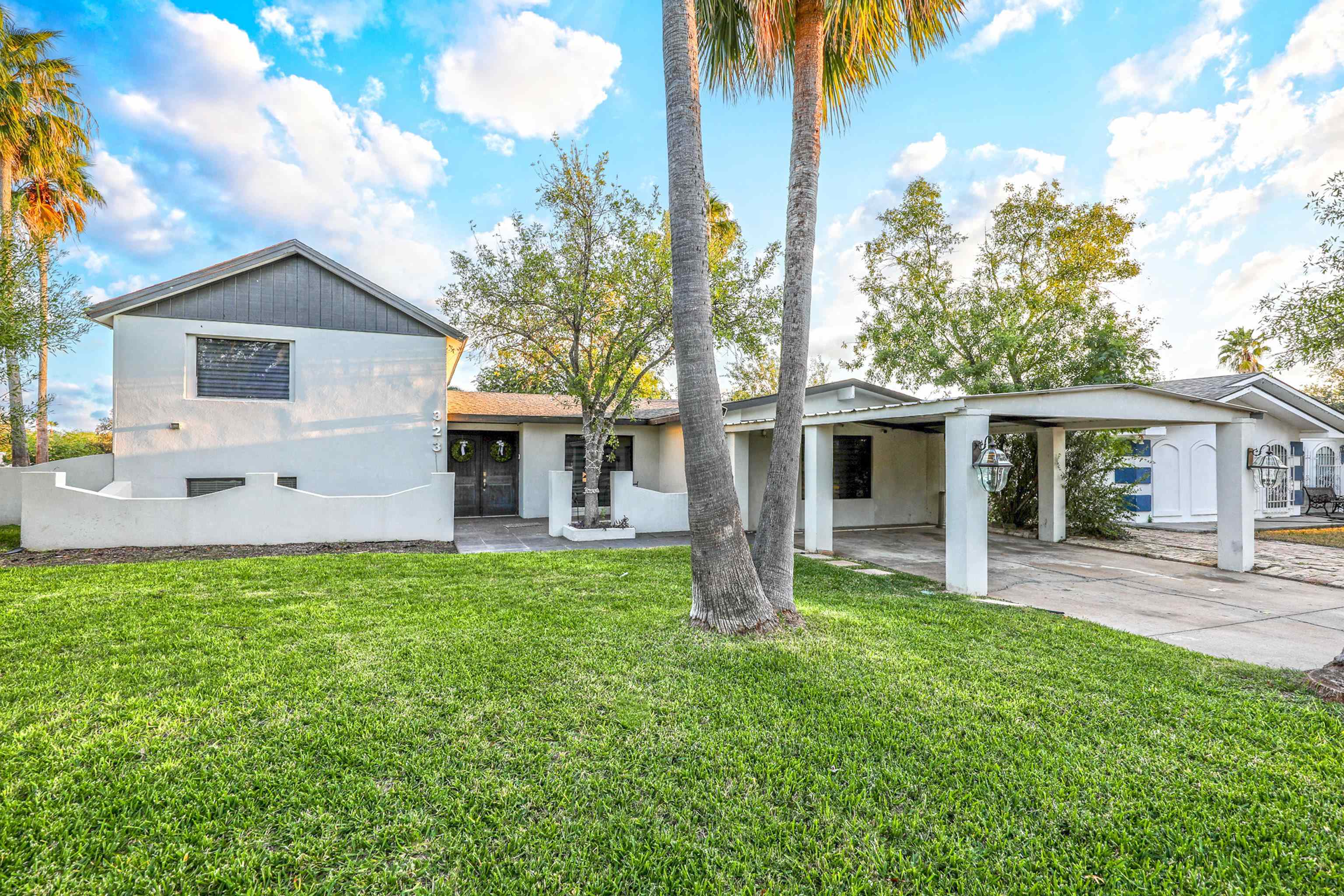 323 Farrell Road Laredo, TX 78045 - Photo 1 of 1 a front view of house with yard and seating area