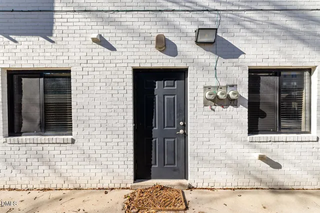 a front view of a building with a entrance