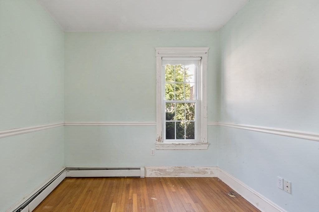 34 Harding Street Fall River, MA 02720 - Photo 19 of 32 a view of a room with wooden floor and window