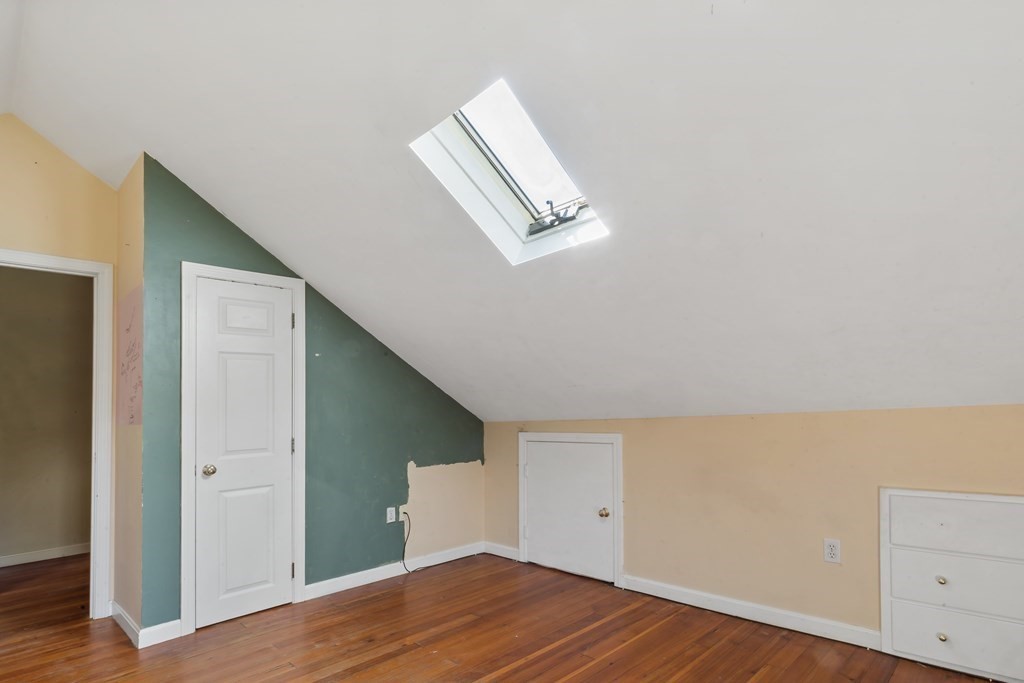34 Harding Street Fall River, MA 02720 - Photo 28 of 32 a view of room with wooden floor and cabinet