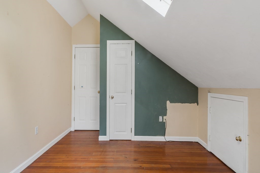 34 Harding Street Fall River, MA 02720 - Photo 29 of 32 a view of an empty room with wooden floor and closet