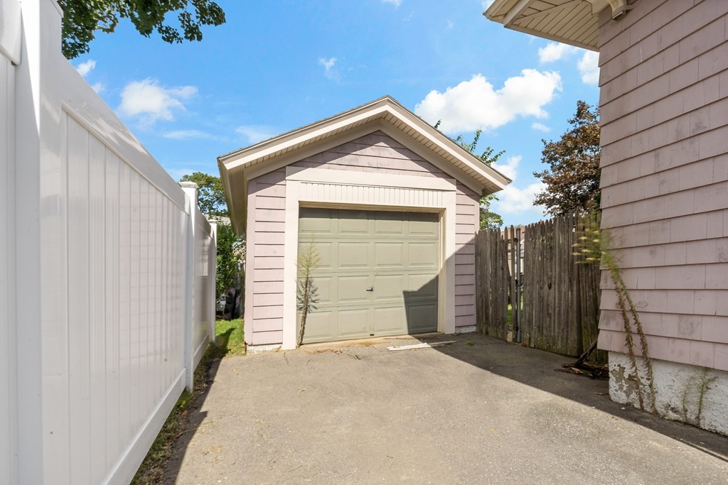 34 Harding Street Fall River, MA 02720 - Photo 3 of 32 a view of a house with a garage