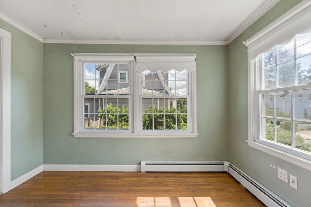 34 Harding Street Fall River, MA 02720 - Photo 7 of 32 a view of a room with wooden floor and windows