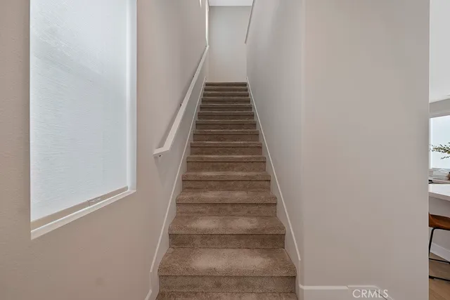 a bathroom with a sink a mirror and a shower