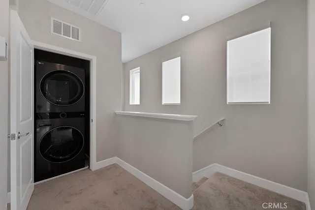 a bathroom with a toilet and a bathtub