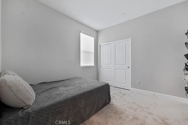 an aerial view of multiple houses with yard