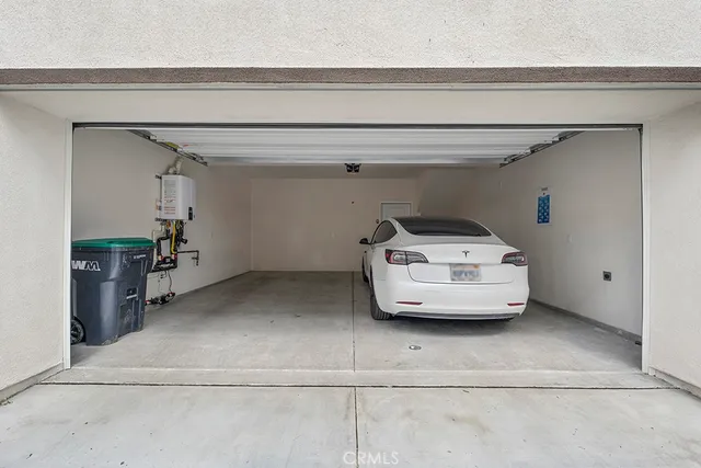 an aerial view of a house with a lake view