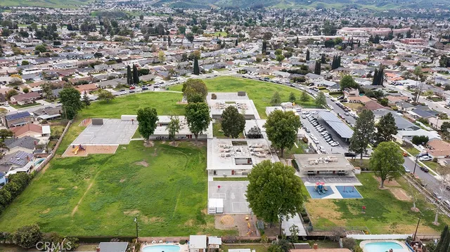 a view of a balcony with yard