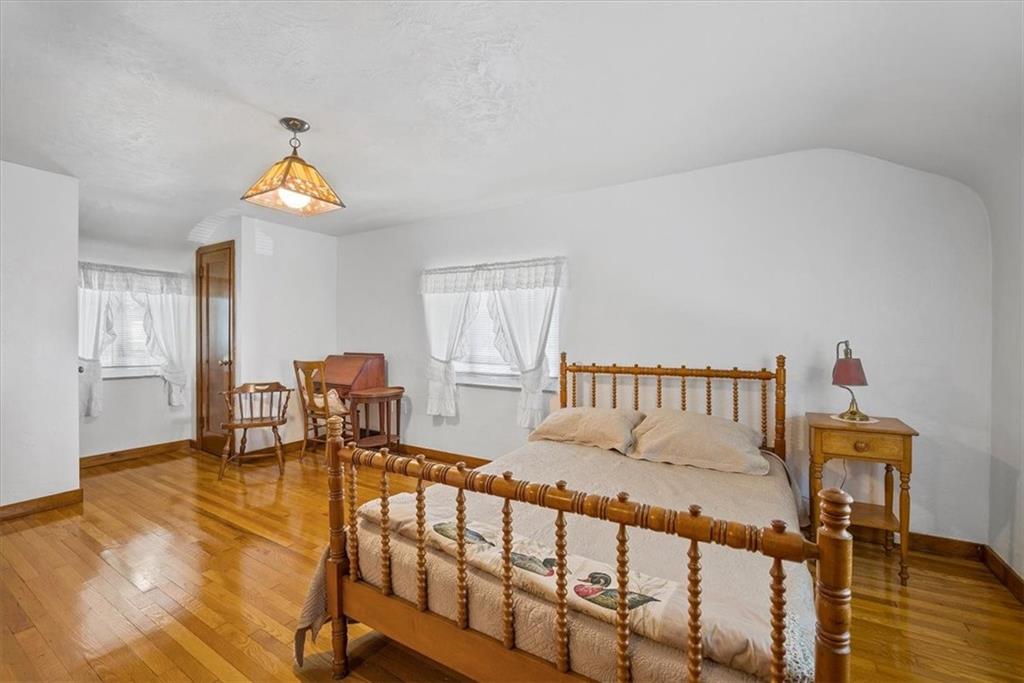 364 Goldsmith Road Pittsburgh, PA 15237 - Photo 14 of 25 a view of a bedroom with furniture and wooden floor