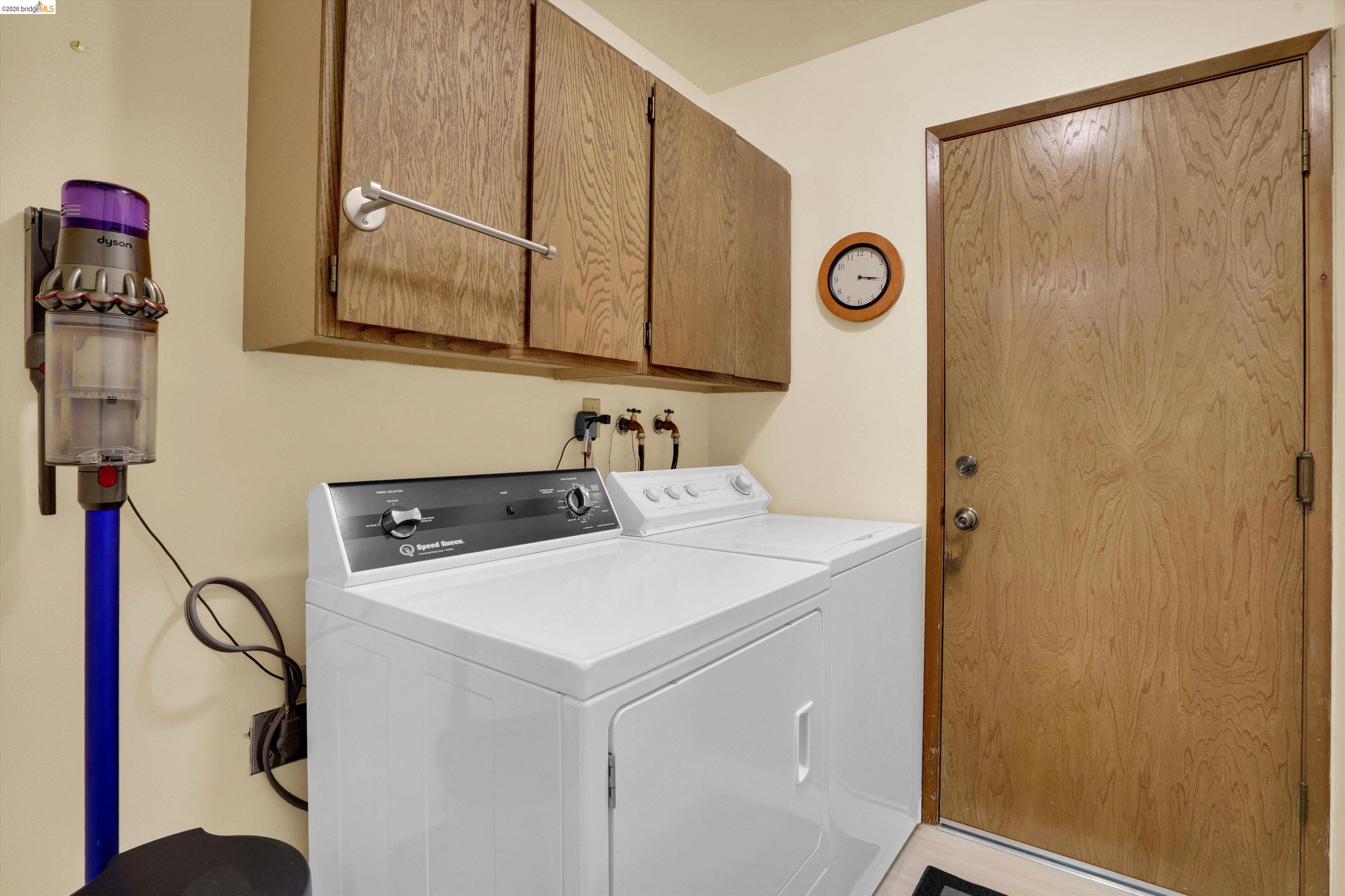 5001 St Garrett Court Concord, CA 94521 - Photo 28 of 45 Dedicated laundry space featuring a white washer and dryer set
