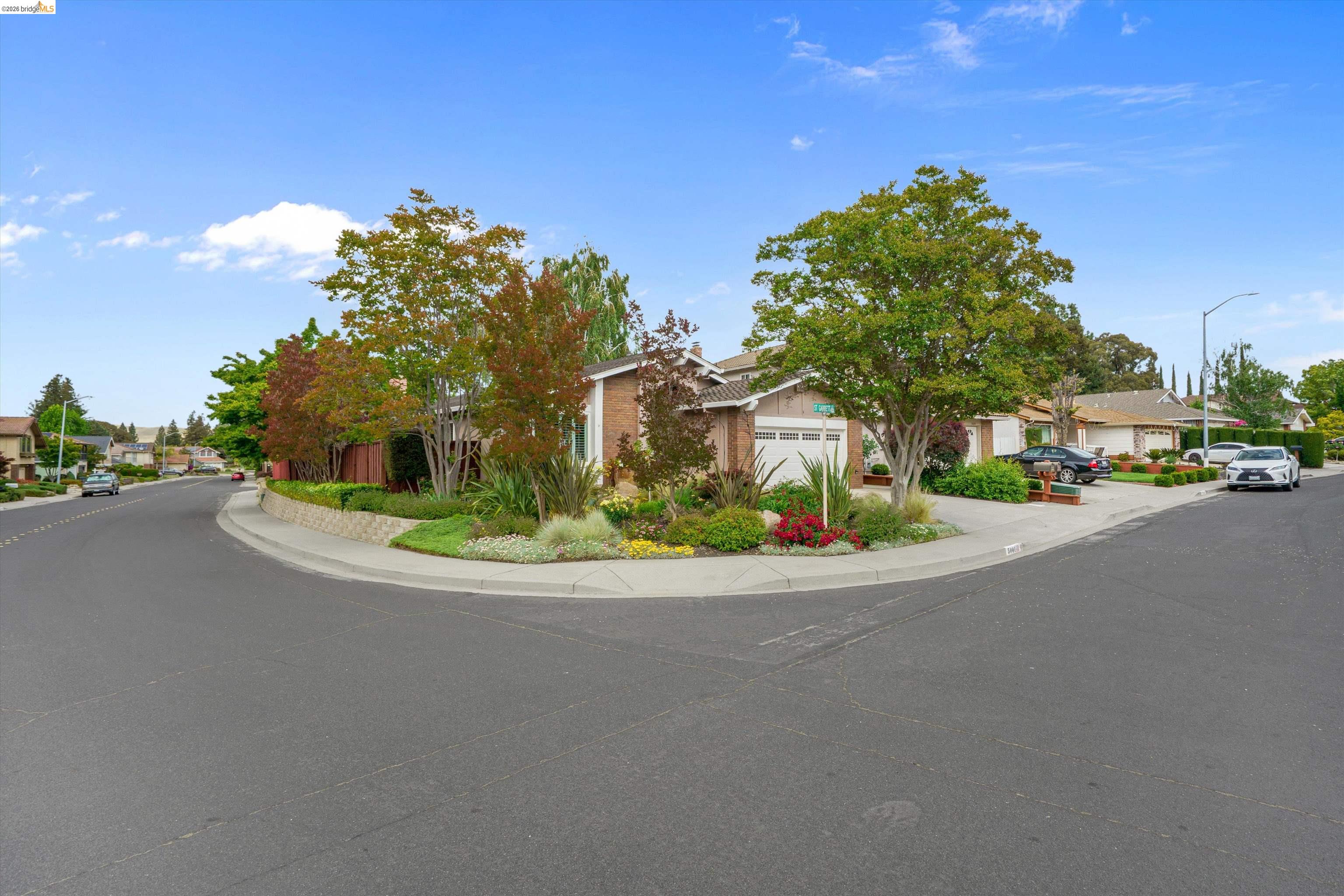 5001 St Garrett Court Concord, CA 94521 - Photo 6 of 45 Corner lot residence featuring a brick exterior and a two-car garage