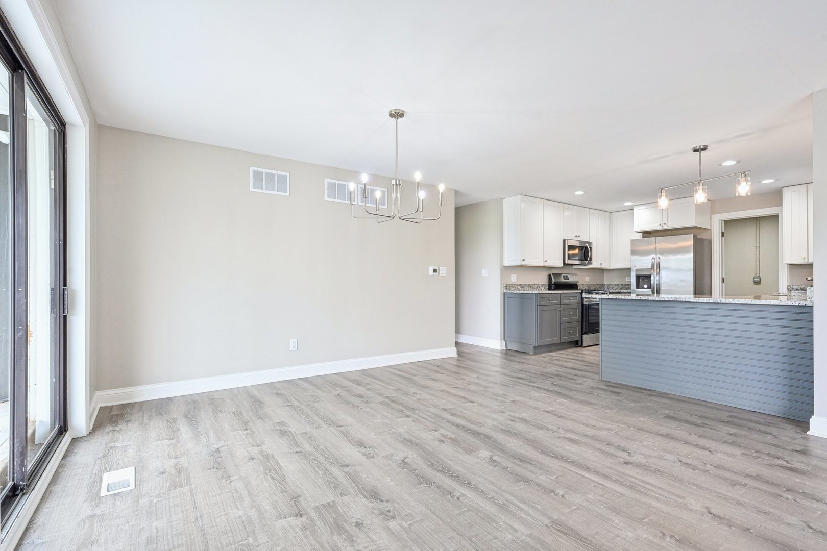 1406 Busse Road Marengo, IL 60152 - Photo 11 of 76 a view of kitchen with wooden floor