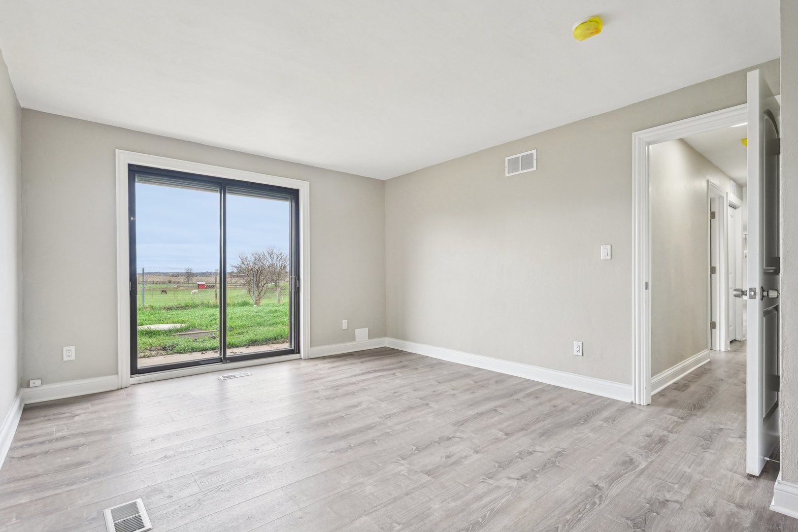1406 Busse Road Marengo, IL 60152 - Photo 30 of 76 a view of an empty room with a window