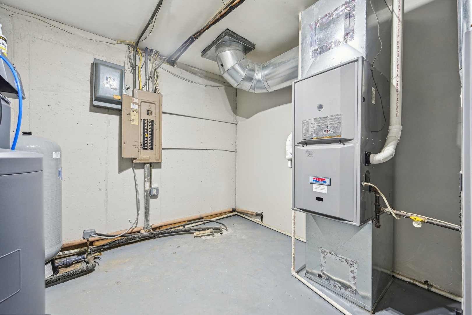 1406 Busse Road Marengo, IL 60152 - Photo 43 of 76 a view of storage and utility room with racks on the wall