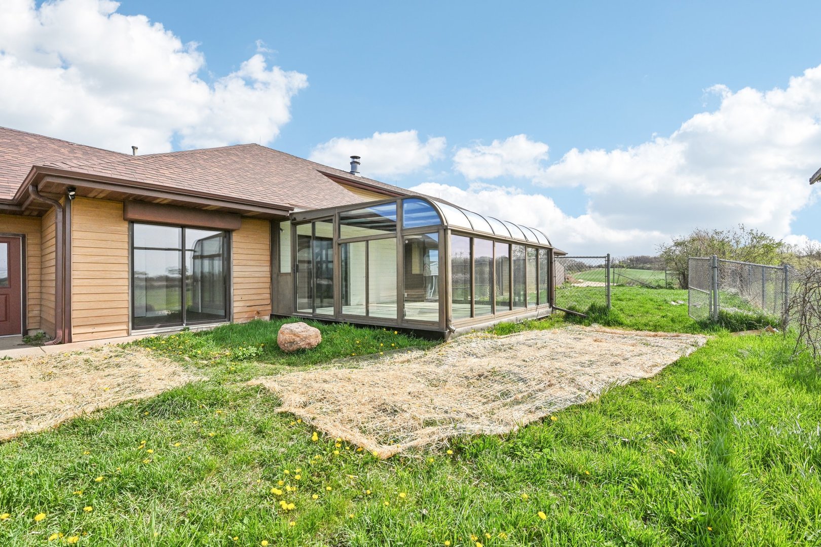 1406 Busse Road Marengo, IL 60152 - Photo 51 of 76 a view of a house with backyard and porch