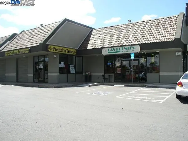 a front view of a building with street