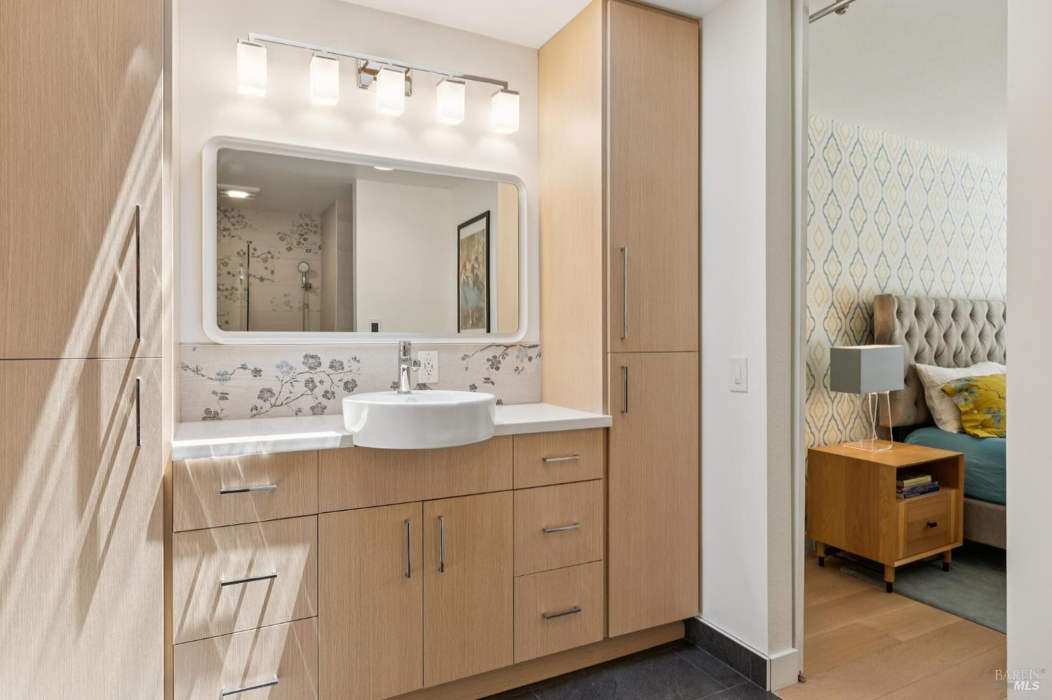 1045 Susan Way Novato, CA 94947 - Photo 41 of 62 Upscale primary bathroom with custom cabinetry and tiling.