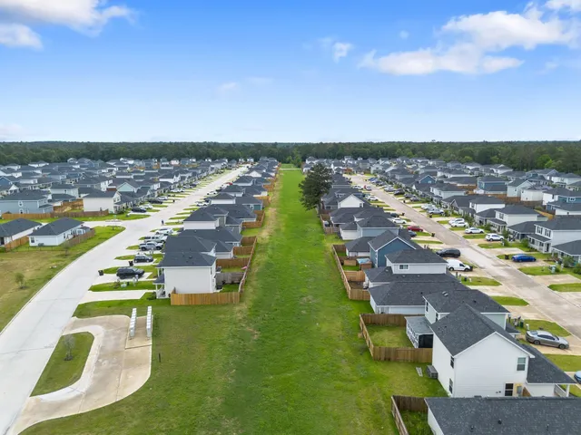 a view of swimming pool with a yard