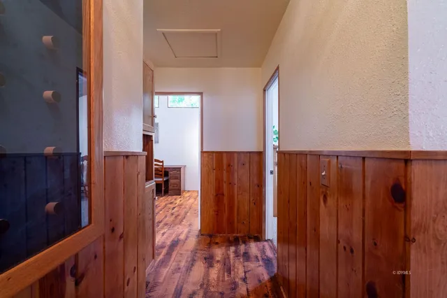 a view of a backyard of the house