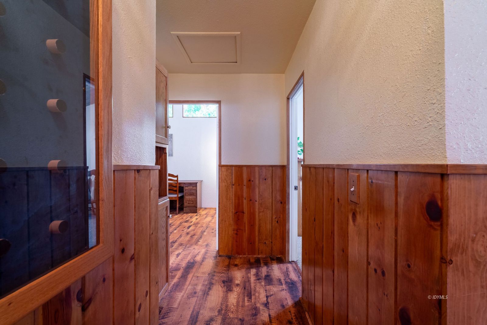 59341 Courtesy Drive Mountain Center, CA 92561 - Photo 24 of 49 a view of a hallway with wooden floor and stairs