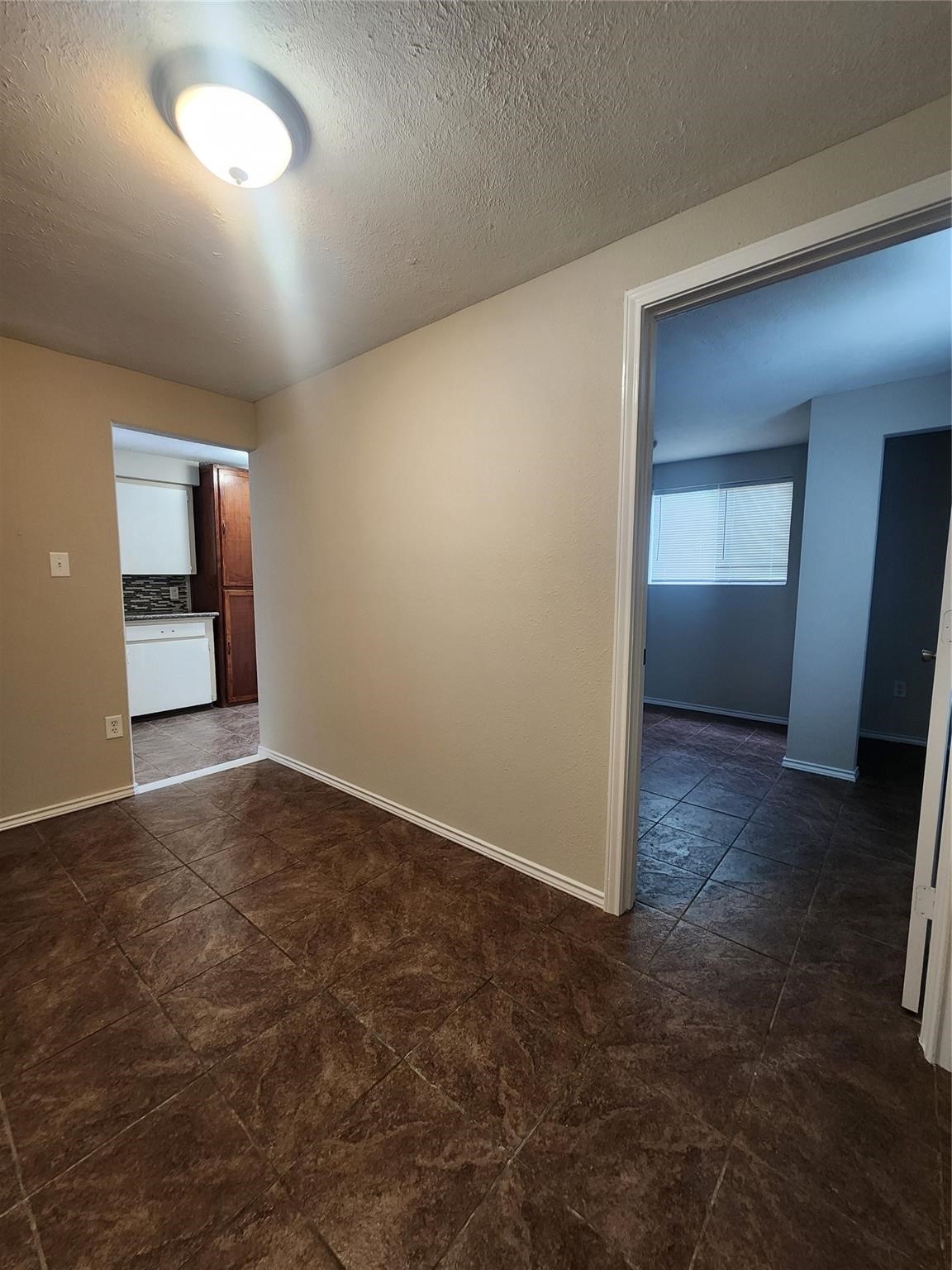 221 East Lobit Avenue, Unit A Baytown, TX 77520 - Photo 3 of 6 a view of an empty room and window