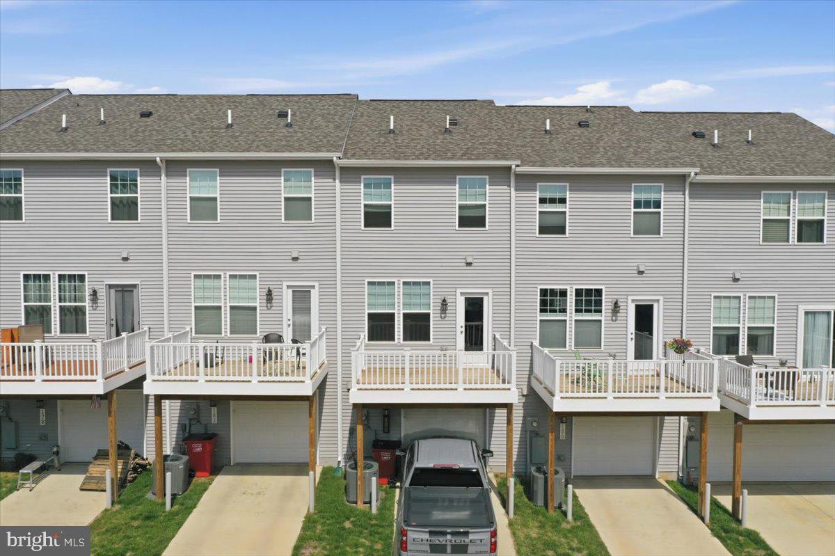 186 Coolidge Avenue Ranson, WV 25438 - Photo 37 of 41 Charming townhomes with inviting decks.