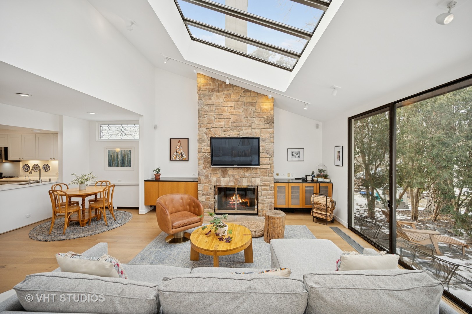 1413 Tower Road Winnetka, IL 60093 - Photo 11 of 32 a living room with furniture fireplace and a flat screen tv