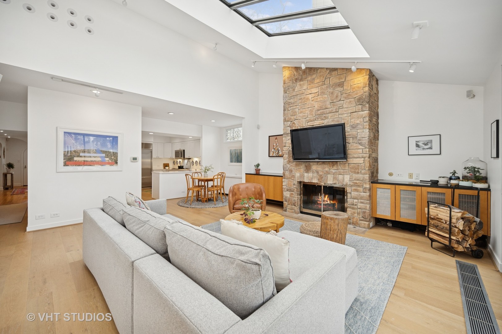 1413 Tower Road Winnetka, IL 60093 - Photo 12 of 32 a living room with fireplace furniture and a flat screen tv