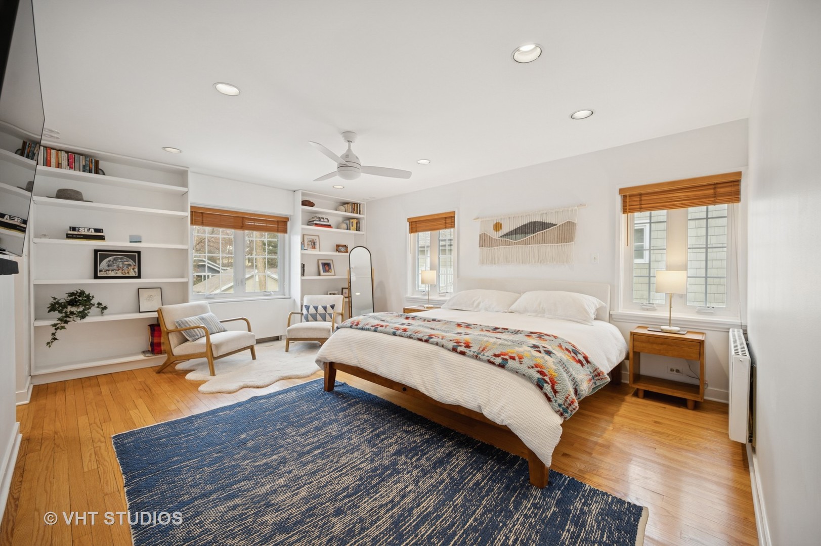 1413 Tower Road Winnetka, IL 60093 - Photo 15 of 32 a bedroom with a bed and wooden floor