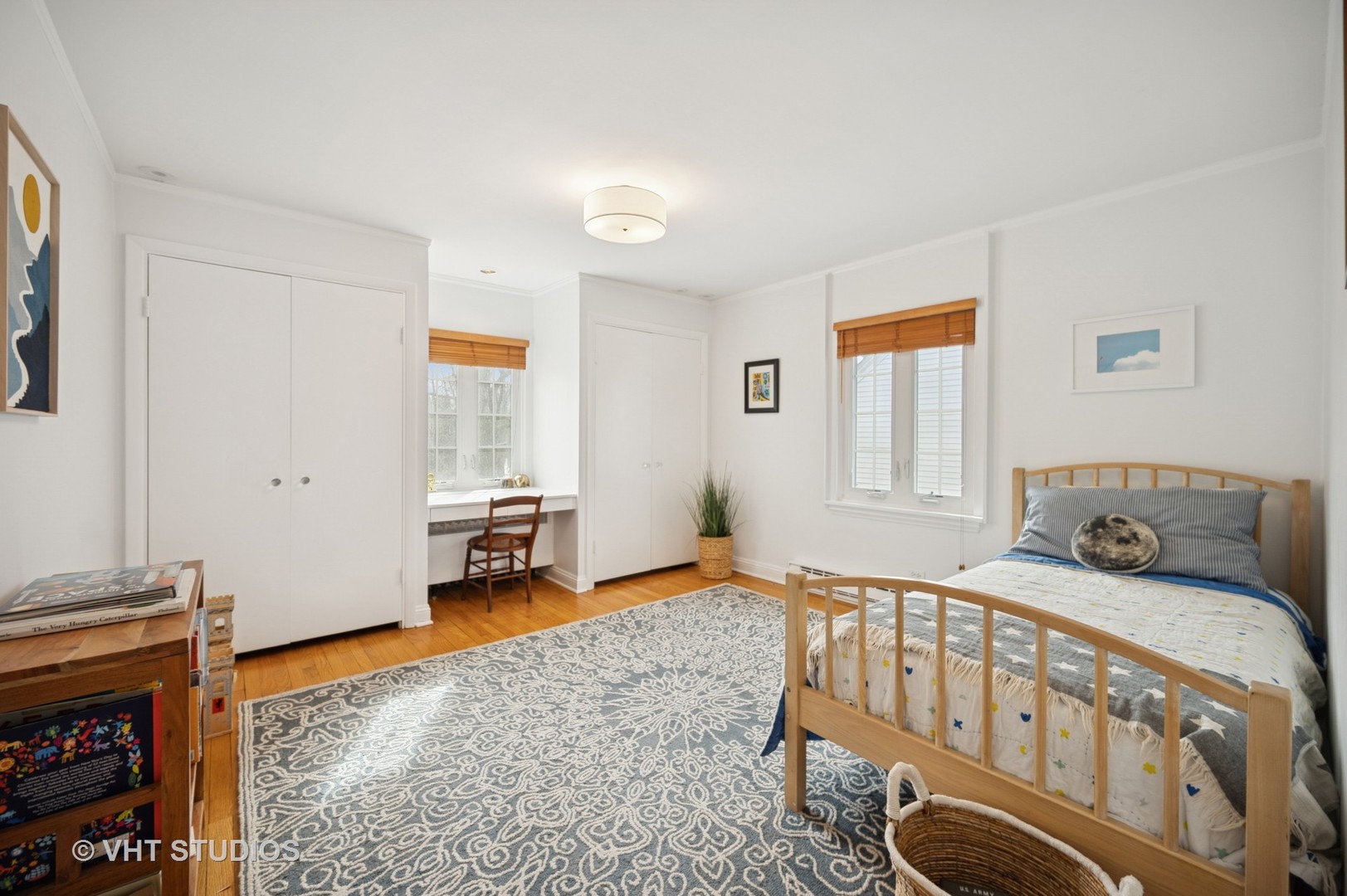 1413 Tower Road Winnetka, IL 60093 - Photo 19 of 32 a bedroom with furniture and a window