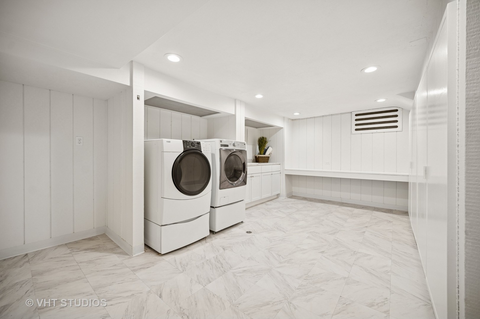 1413 Tower Road Winnetka, IL 60093 - Photo 24 of 32 a view of a storage & utility room with two washing machine