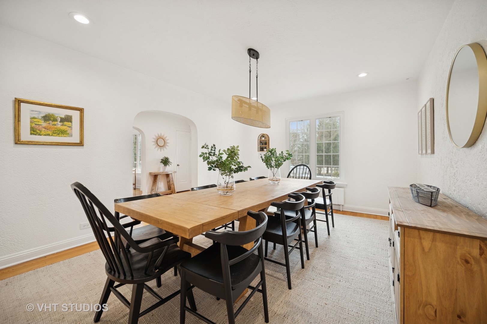1413 Tower Road Winnetka, IL 60093 - Photo 6 of 32 a view of a dining room with furniture and wooden floor
