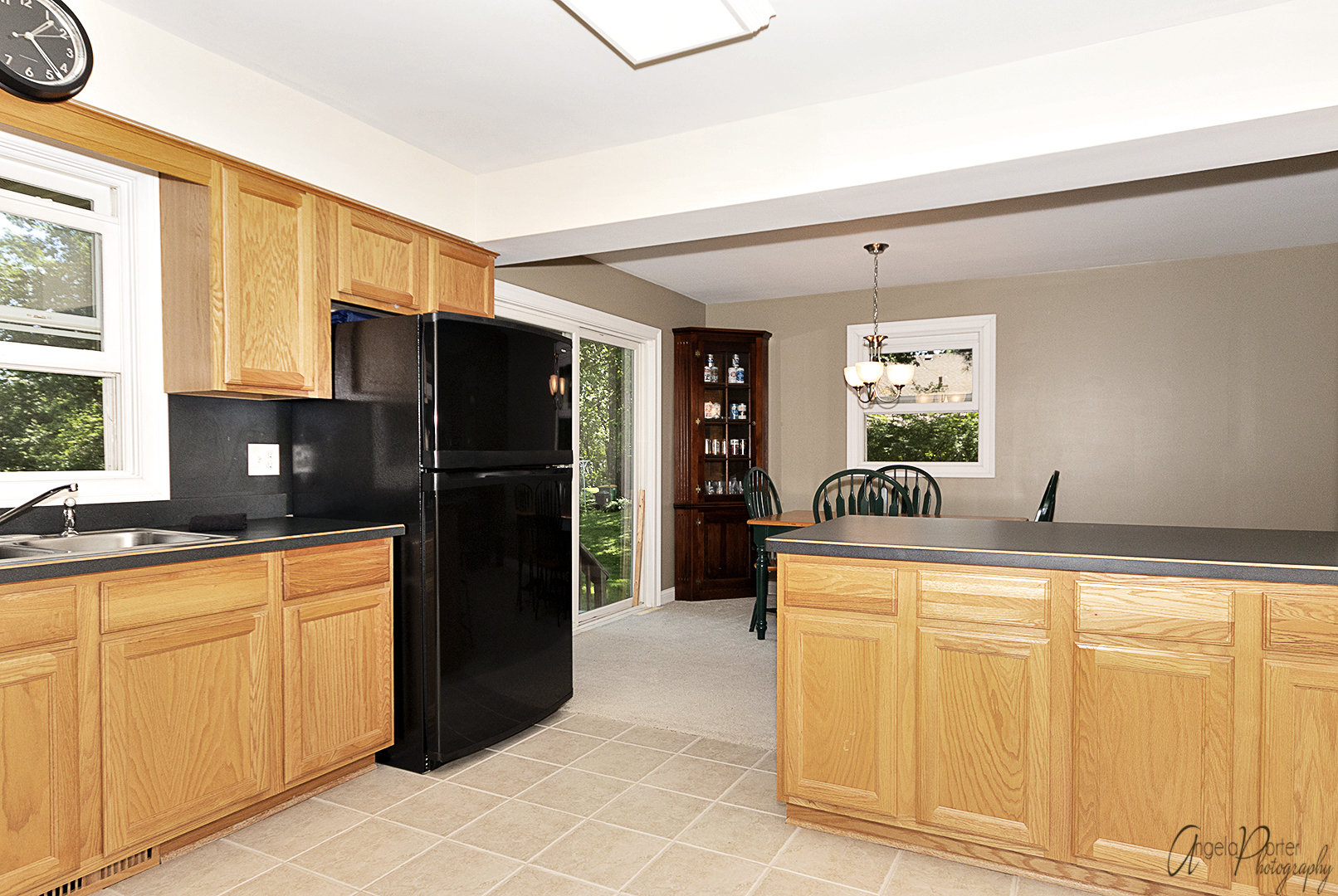 135 Eagle Point Road Fox Lake, IL 60020 - Photo 12 of 27 a kitchen with stainless steel appliances granite countertop a refrigerator and a sink