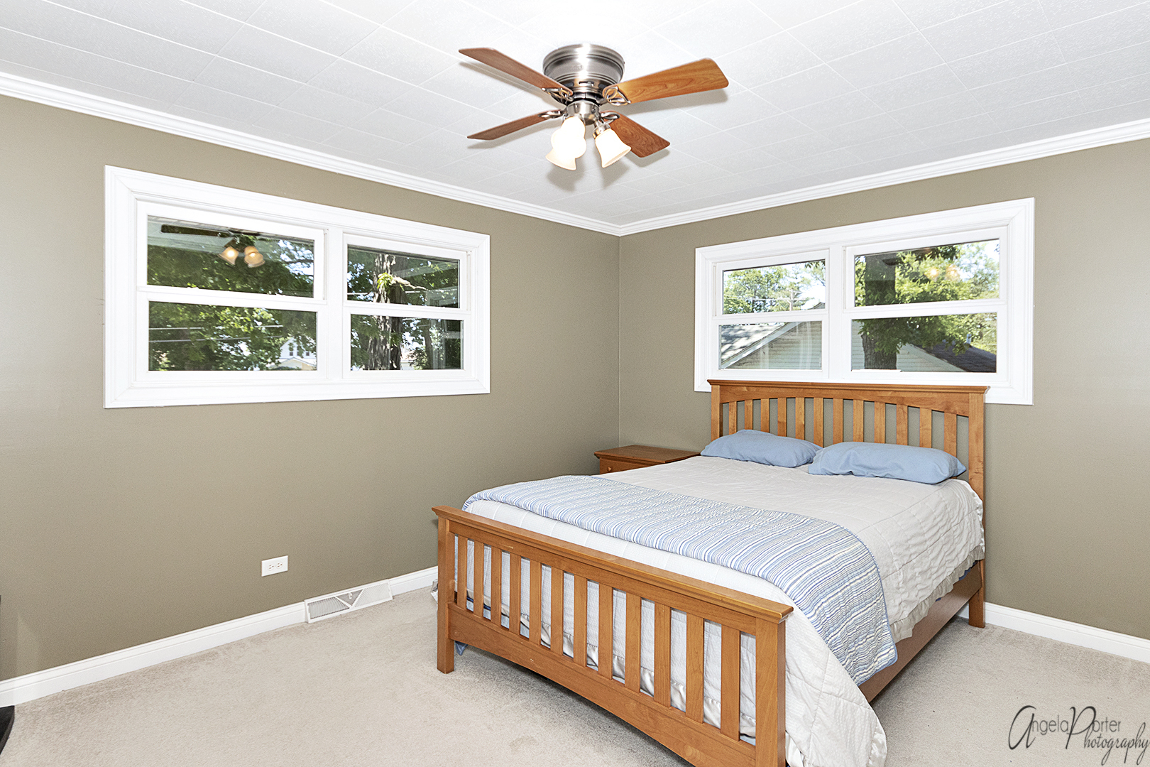135 Eagle Point Road Fox Lake, IL 60020 - Photo 14 of 27 a bedroom with a bed and a window