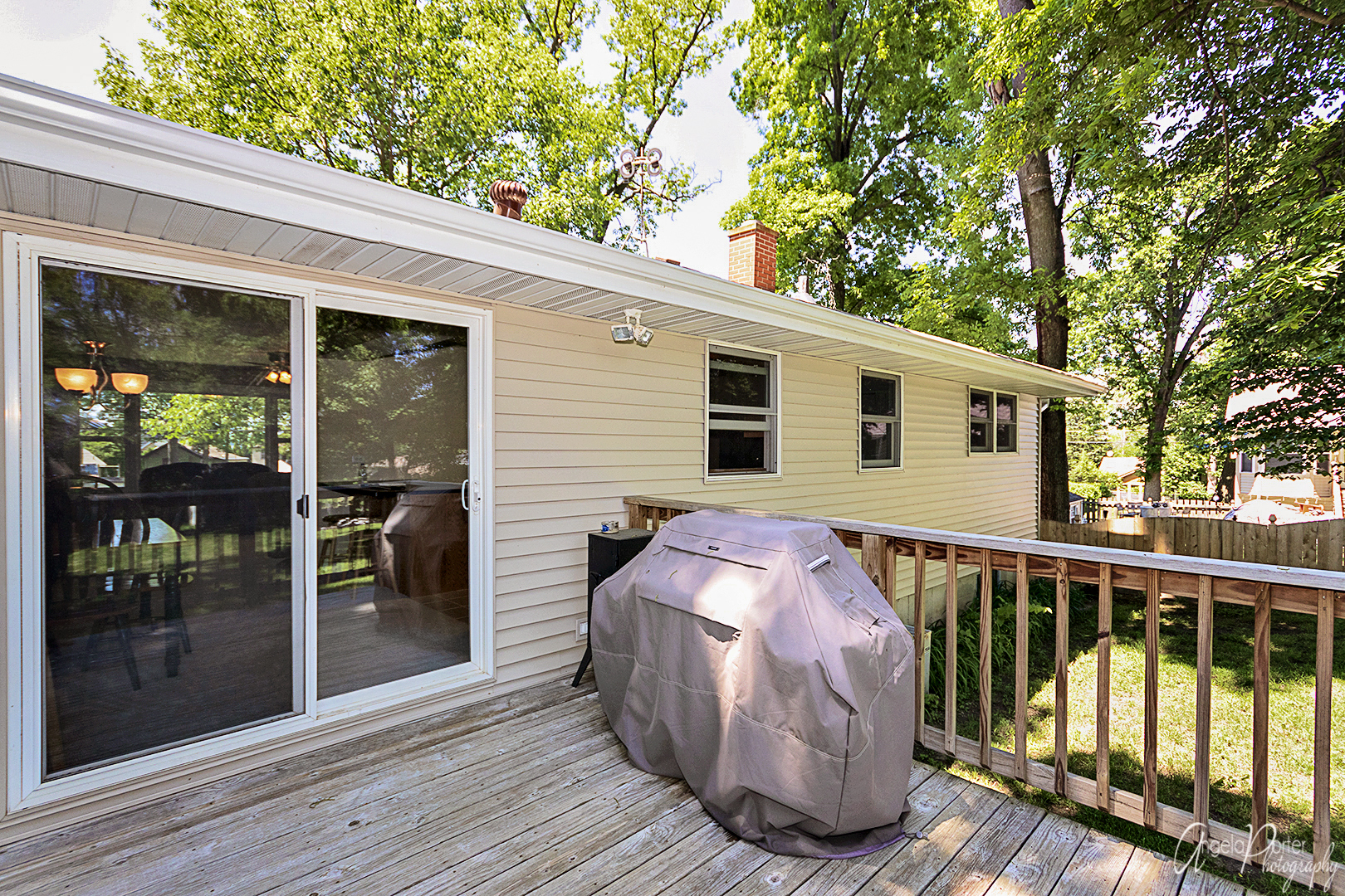 135 Eagle Point Road Fox Lake, IL 60020 - Photo 22 of 27 a view of a wooden deck and a yard